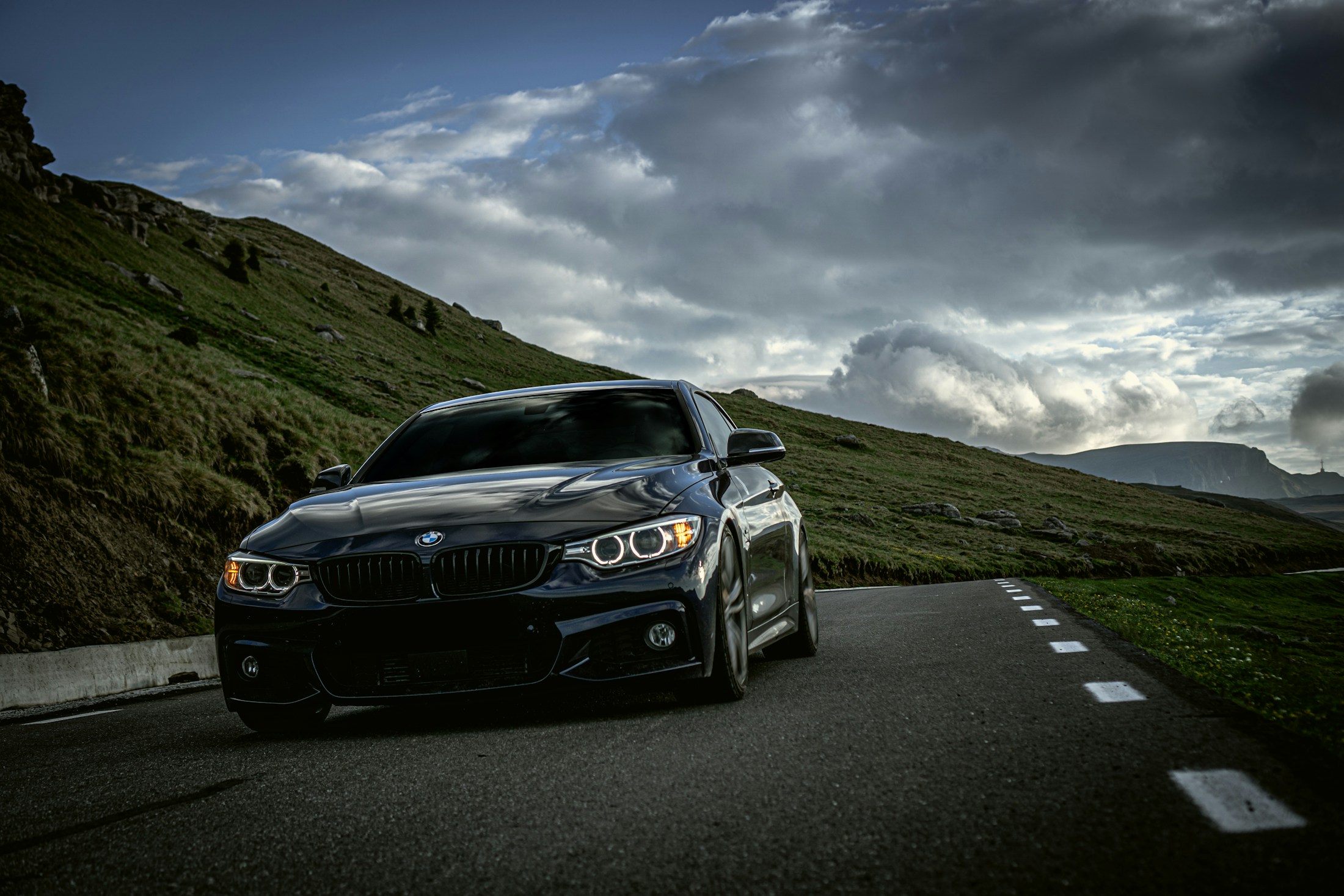Premium car on a scenic mountain road